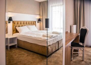 Фото номера Трехместный номер с балконом или террасой Курортные отели Amber Park Spa г. Нехоже 2