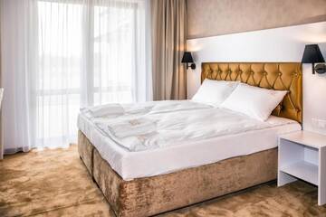 Фото номера Трехместный номер с балконом или террасой Курортные отели Amber Park Spa г. Нехоже 3
